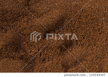 a large amount of ground coffee powder close-up 120549307