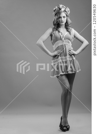 Charming girl smiling sincerely 120549630