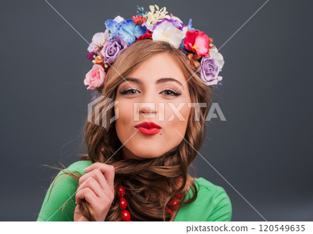 Charming girl smiling sincerely Charming girl smiling sincerely 120549635