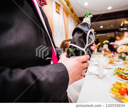 Drink wine, champagne, pour 120550034