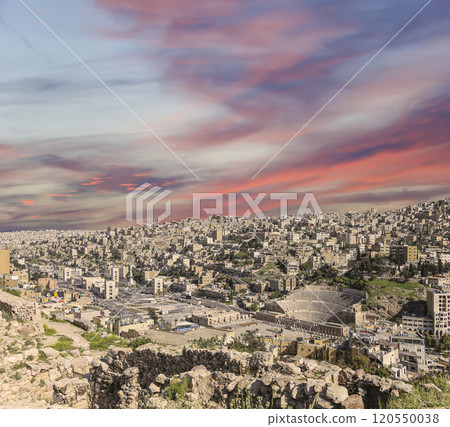 Amman city landmarks-- old roman Citadel Hill, Jordan. Against the background of a beautiful sky with clouds Amman city landmarks-- old roman Citadel Hill, Jordan. Against the background of a beautiful sky with clouds 120550038
