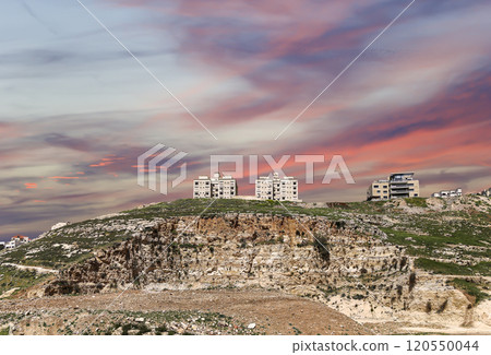 Amman city landmarks-- old roman Citadel Hill, Jordan. Against the background of a beautiful sky with clouds Amman city landmarks-- old roman Citadel Hill, Jordan. Against the background of a beautiful sky with clouds 120550044