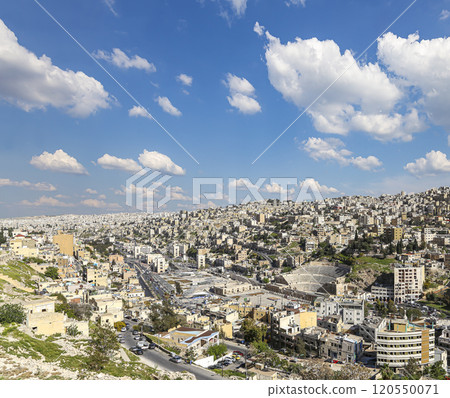 Amman city landmarks-- old roman Citadel Hill, Jordan. Against the background of a beautiful sky with clouds Amman city landmarks-- old roman Citadel Hill, Jordan. Against the background of a beautiful sky with clouds 120550071