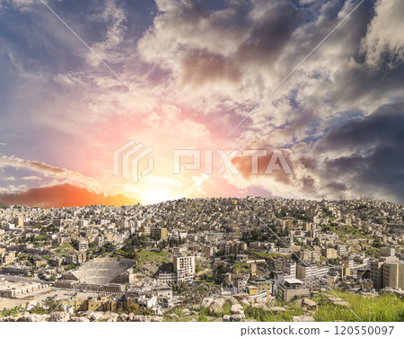 Amman city landmarks-- old roman Citadel Hill, Jordan. Against the background of a beautiful sky with clouds Amman city landmarks-- old roman Citadel Hill, Jordan. Against the background of a beautiful sky with clouds 120550097