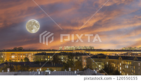 Aerial view of Moscow (night, against the sunset) and full moon, Cheryomushki district near Profsoyuznaya metro station, Russia 120550155