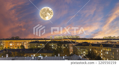 Aerial view of Moscow (night, against the sunset) and full moon, Cheryomushki district near Profsoyuznaya metro station, Russia 120550159