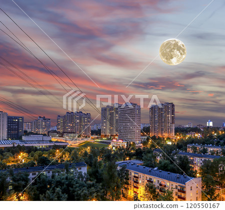 Aerial view of Moscow (night, against the sunset) and full moon, Cheryomushki district near Profsoyuznaya metro station, Russia 120550167
