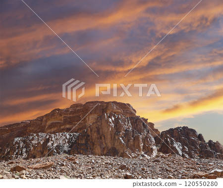Mountains of Wadi Rum Desert also known as The Valley of the Moon is a valley cut into the sandstone and granite rock in southern Jordan 60 km to the east of Aqaba Mountains of Wadi Rum Desert also known as The Valley of the Moon is a valley cut into the sandstone and granite rock in southern Jordan 60 km to the east of Aqaba 120550280