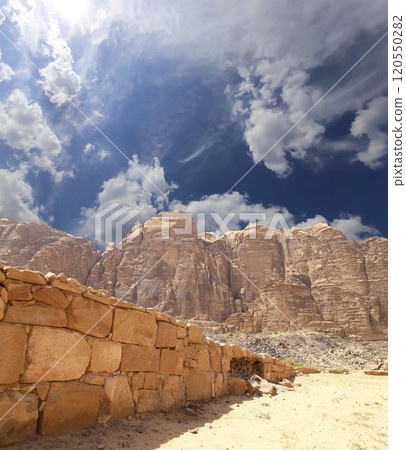Mountains of Wadi Rum Desert also known as The Valley of the Moon is a valley cut into the sandstone and granite rock in southern Jordan 60 km to the east of Aqaba 120550282