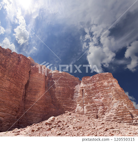 Mountains of Wadi Rum Desert also known as The Valley of the Moon is a valley cut into the sandstone and granite rock in southern Jordan 60 km to the east of Aqaba 120550315
