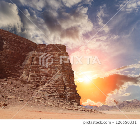 Mountains of Wadi Rum Desert also known as The Valley of the Moon is a valley cut into the sandstone and granite rock in southern Jordan 60 km to the east of Aqaba Mountains of Wadi Rum Desert also known as The Valley of the Moon is a valley cut into the sandstone and granite rock in southern Jordan 60 km to the east of Aqaba 120550331