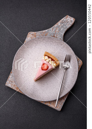 Sweet cheesecake with mascarpone or Philadelphia cheese, jelly and strawberries 120550442