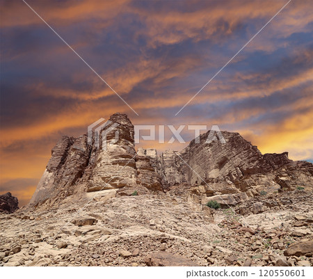 Mountains of Wadi Rum Desert also known as The Valley of the Moon is a valley cut into the sandstone and granite rock in southern Jordan 60 km to the east of Aqaba Mountains of Wadi Rum Desert also known as The Valley of the Moon is a valley cut into the sandstone and granite rock in southern Jordan 60 km to the east of Aqaba 120550601
