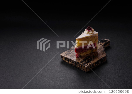 Sweet delicious cake with a layer of raspberry jam Sweet delicious cake with a layer of raspberry jam 120550698