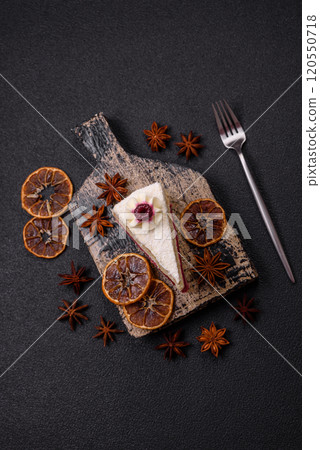 Sweet delicious cake with a layer of raspberry jam 120550718