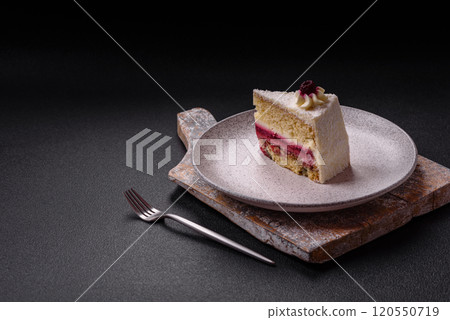 Sweet delicious cake with a layer of raspberry jam 120550719