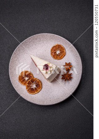 Sweet delicious cake with a layer of raspberry jam Sweet delicious cake with a layer of raspberry jam 120550731