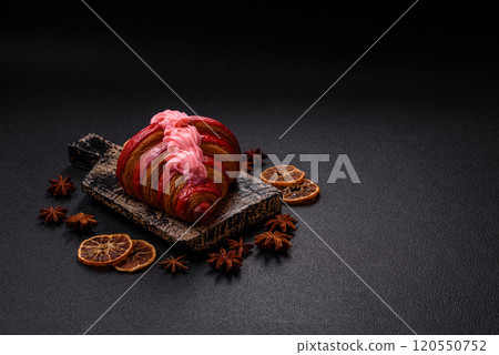 Crispy fresh red croissant with cream and strawberries Crispy fresh red croissant with cream and strawberries 120550752