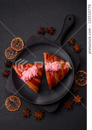 Crispy fresh red croissant with cream and strawberries 120550776