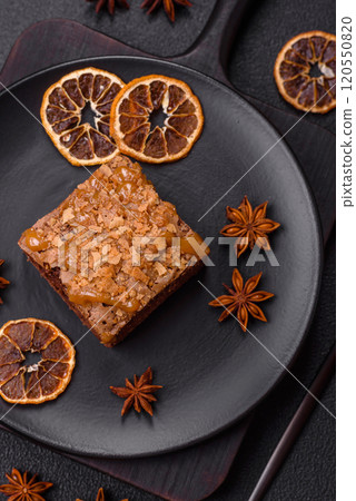 Chocolate sweet brownie cake in a square shape 120550820