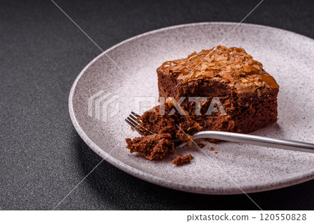 Chocolate sweet brownie cake in a square shape Chocolate sweet brownie cake in a square shape 120550828
