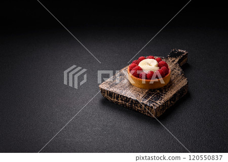 Sweet tartlet with raspberries and cream Sweet tartlet with raspberries and cream 120550837