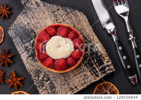 Sweet tartlet with raspberries and cream Sweet tartlet with raspberries and cream 120550844