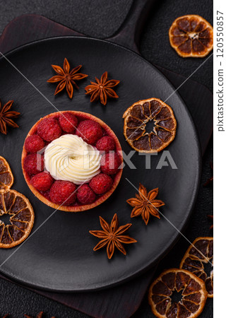 Sweet tartlet with raspberries and cream Sweet tartlet with raspberries and cream 120550857