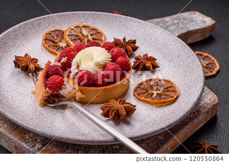 Sweet tartlet with raspberries and cream Sweet tartlet with raspberries and cream 120550864