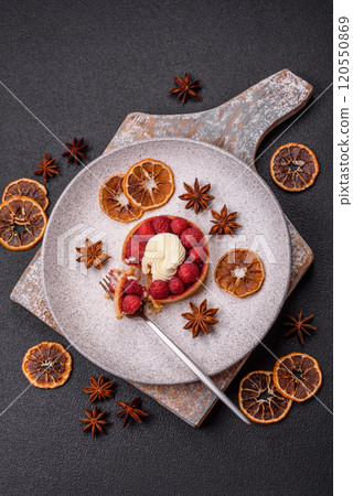 Sweet tartlet with raspberries and cream Sweet tartlet with raspberries and cream 120550869