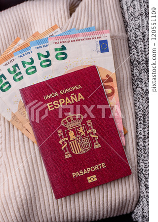 International passport of a citizen of Spain on a suitcase 120551109