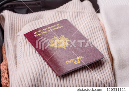 International passport of a French citizen on a suitcase International passport of a French citizen on a suitcase 120551111