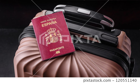 International passport of a citizen of Spain on a suitcase 120551140