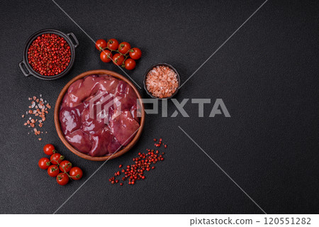 Fresh raw chicken or beef liver with salt, spices and herbs Fresh raw chicken or beef liver with salt, spices and herbs 120551282