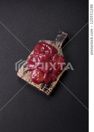 Fresh raw chicken or beef liver with salt, spices and herbs Fresh raw chicken or beef liver with salt, spices and herbs 120551286