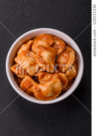 Ravioli with meat or vegetarian with ricotta, salt and spices Ravioli with meat or vegetarian with ricotta, salt and spices 120551336