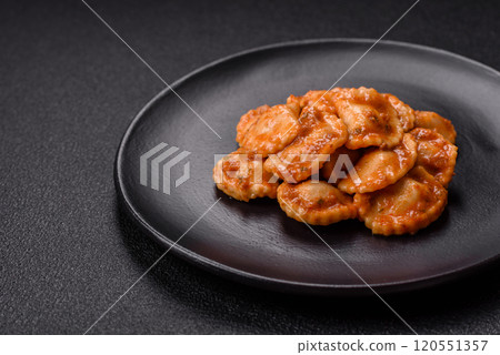 Ravioli with meat or vegetarian with ricotta, salt and spices Ravioli with meat or vegetarian with ricotta, salt and spices 120551357