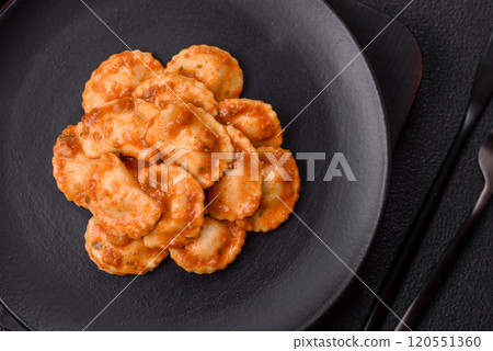 Ravioli with meat or vegetarian with ricotta, salt and spices 120551360