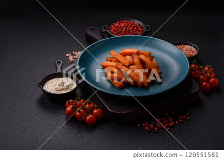 Delicious crispy sweet potato fries with salt, spices and herbs Delicious crispy sweet potato fries with salt, spices and herbs 120551581