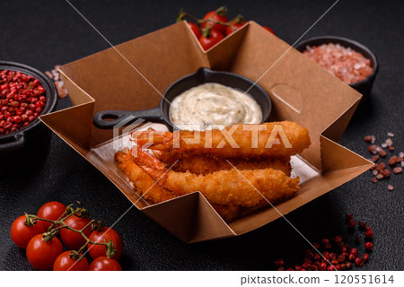 Hot crispy shrimp breaded with salt and spices with white sauce Hot crispy shrimp breaded with salt and spices with white sauce 120551614