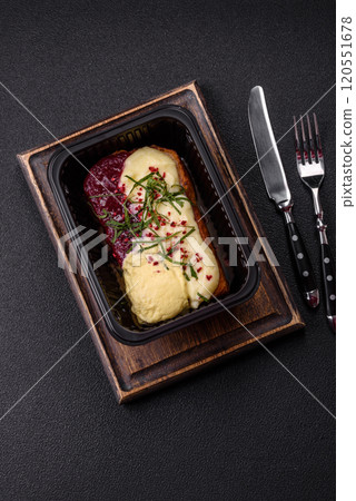 Delicious sweet brioche sandwich with raspberry jam and ricotta cream 120551678