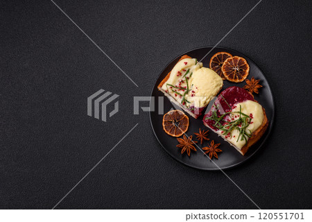 Delicious sweet brioche sandwich with raspberry jam and ricotta cream 120551701