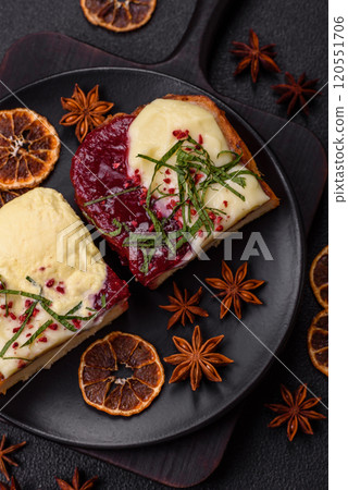 Delicious sweet brioche sandwich with raspberry jam and ricotta cream 120551706