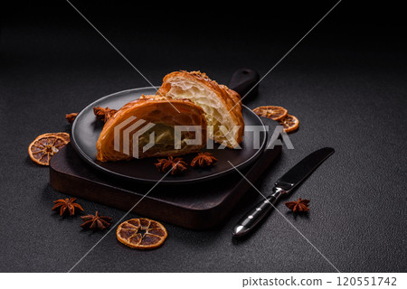 Fresh crispy croissant filled with pistachio cream 120551742