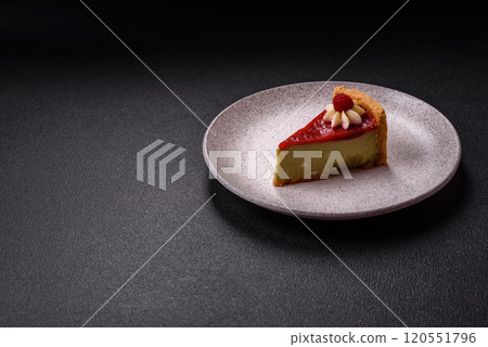 Delicious sweet dessert cheesecake with raspberry and pistachio flavor 120551796