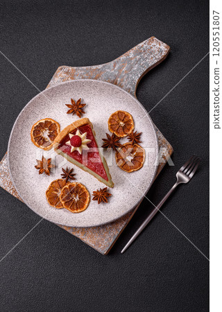 Delicious sweet dessert cheesecake with raspberry and pistachio flavor 120551807