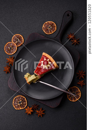 Delicious sweet dessert cheesecake with raspberry and pistachio flavor 120551820