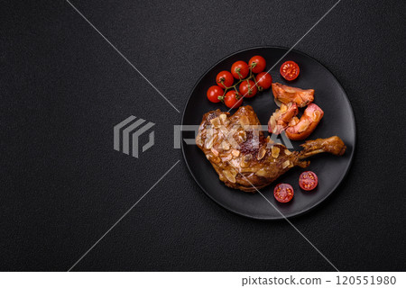 Duck leg baked with apples and sauce Duck leg baked with apples and sauce 120551980