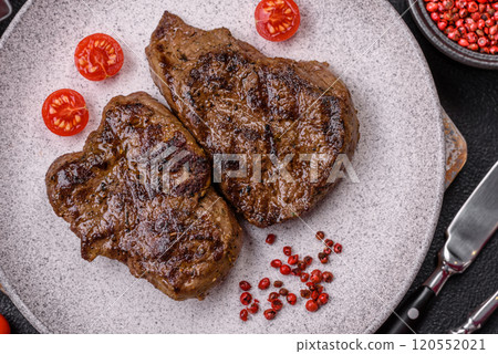 Juicy beef steak grilled with salt, spices and herbs 120552021