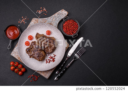 Juicy beef steak grilled with salt, spices and herbs Juicy beef steak grilled with salt, spices and herbs 120552024